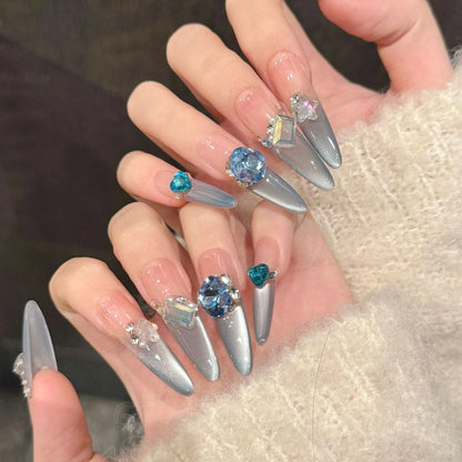 Close-up detail of Blue Danube cat-eye shimmer finish and hand-set crystal gemstones