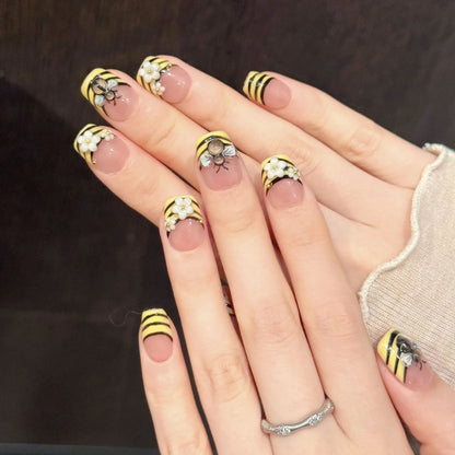 Close-up detail of Bee Garden 3D sculpted bees, white daisies, and playful striped patterns ✨🍯