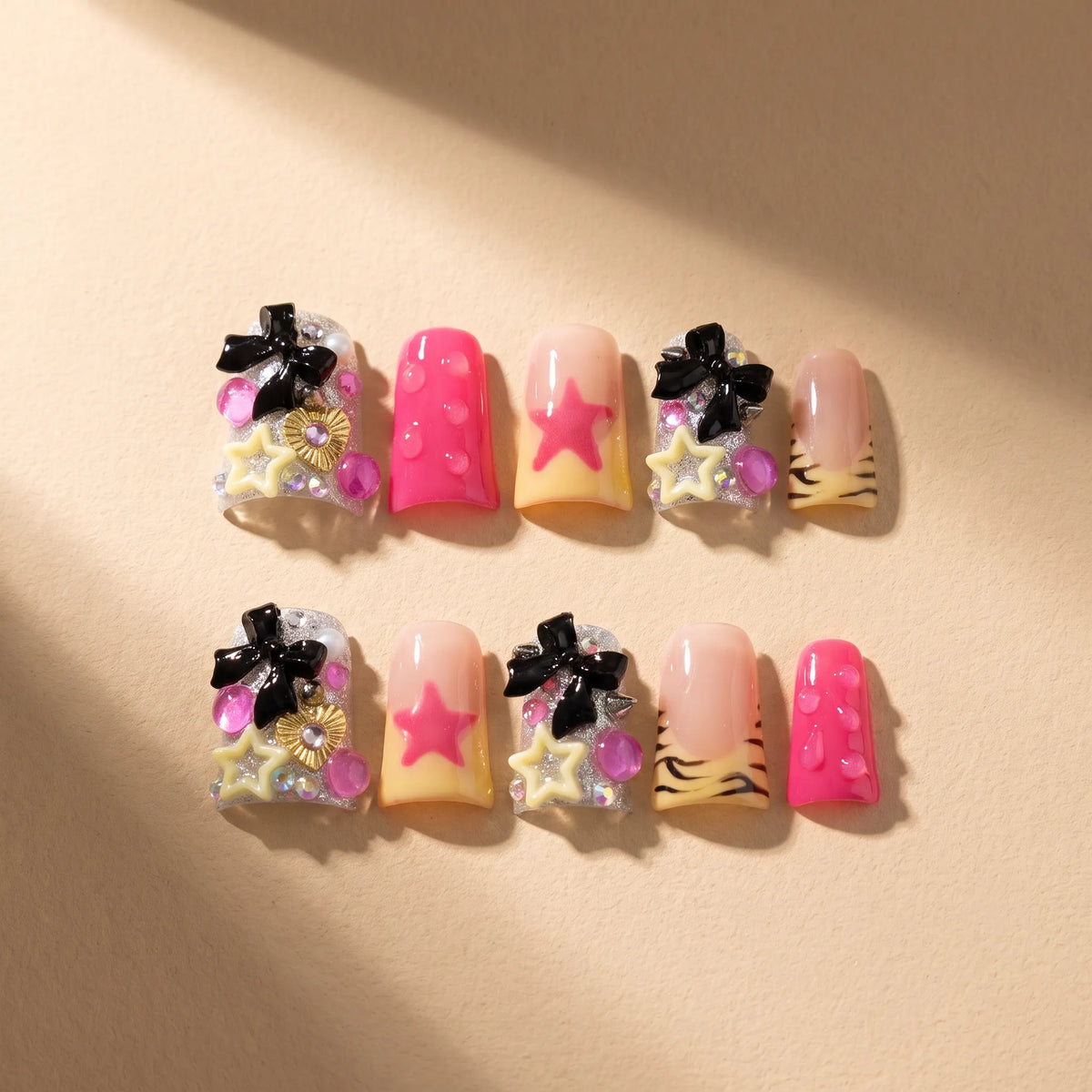 Black Butterfly 10-piece handmade press-on nail set with star and color-block designs - product flat lay 🦋