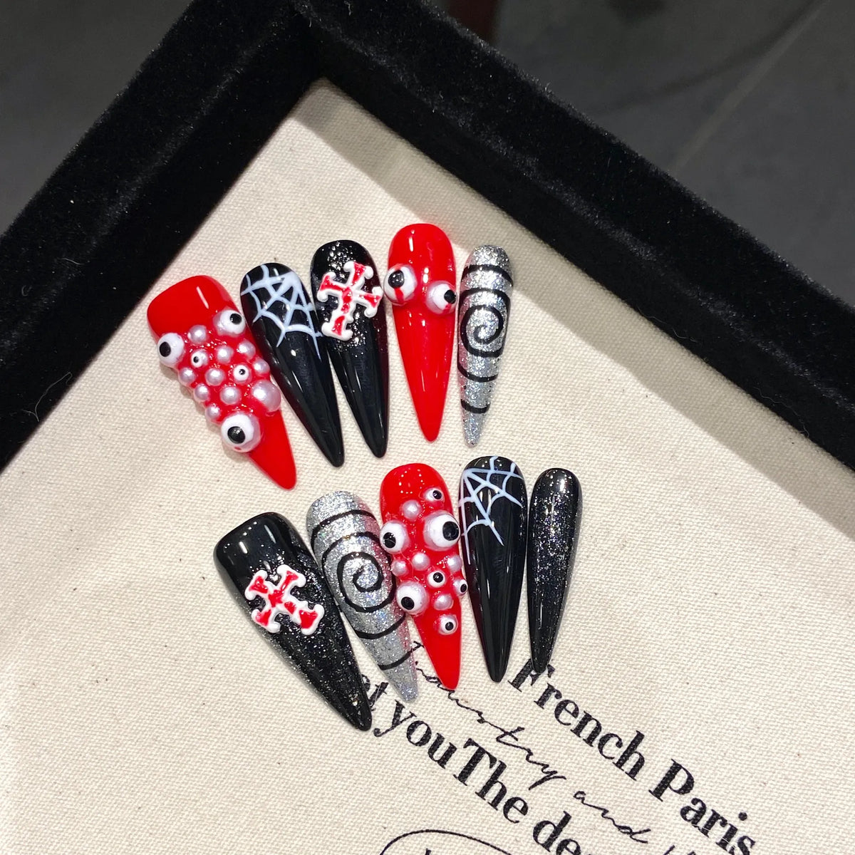 Blood red snake skin long stiletto press-on nails with metal studs on hand 🐍💉