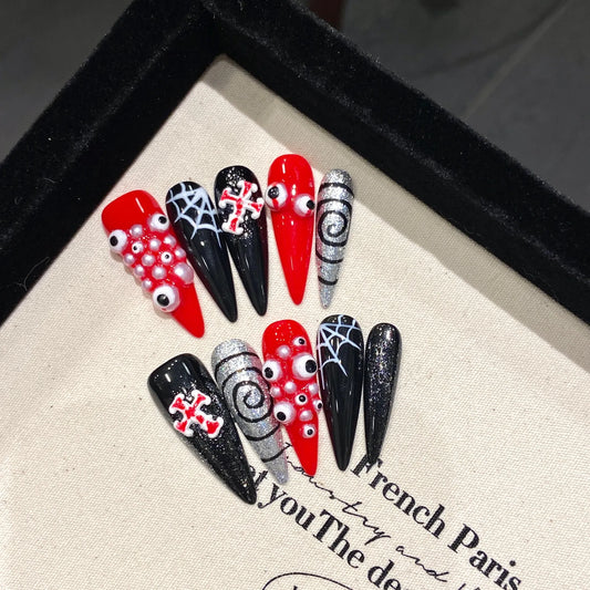 Blood red snake skin long stiletto press-on nails with metal studs on hand 🐍💉