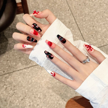 Bloody Eyeball dark girl nails shown on hands with raised eyeballs, mouths and blood-drip art