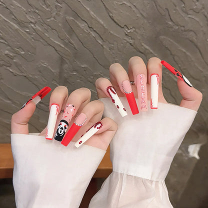 Bloody Ketchup Skull 2136 Extra Long Pipe Coffin press-on nails worn on hands with red and white horror art