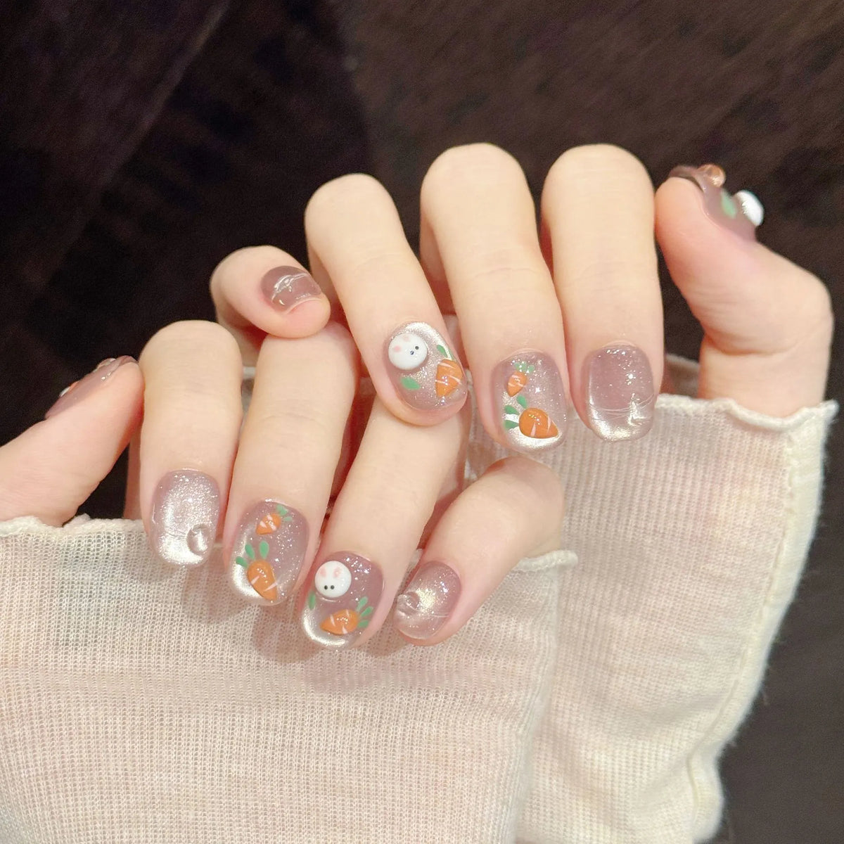 Bunny Carrot square nails angled view showing 3D bunnies, carrots, and cute cartoon art
