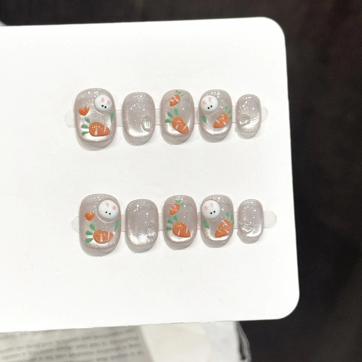 Bunny Carrot short square press-on nails with 3D rabbit and carrot kawaii design on hand - lifestyle shot