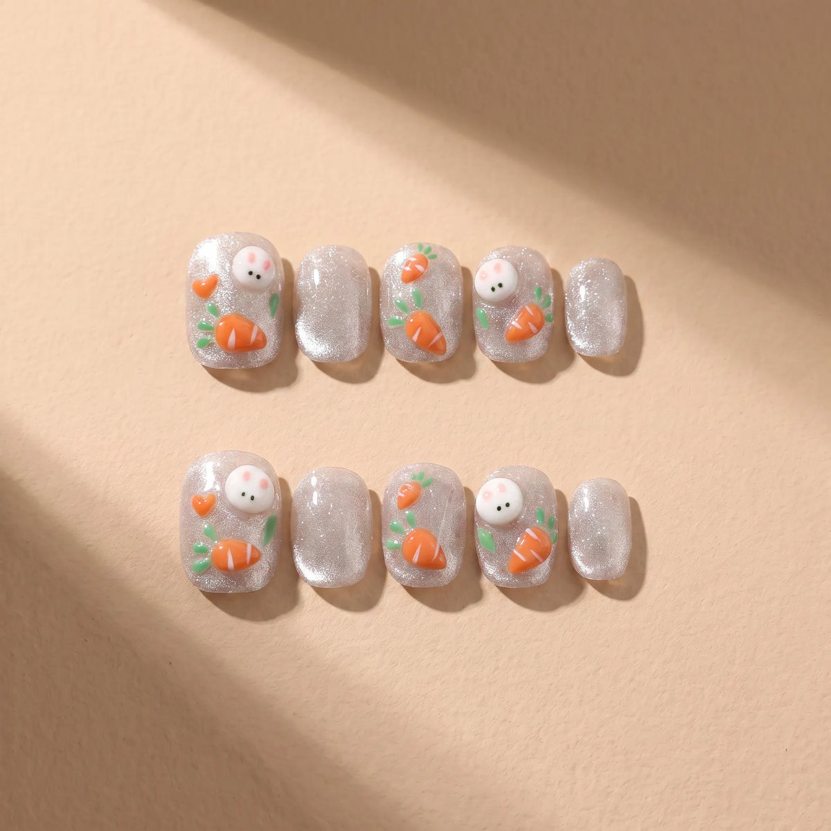 Bunny Carrot 10-piece handmade press-on nail set with 3D rabbit and carrot designs - product flat lay