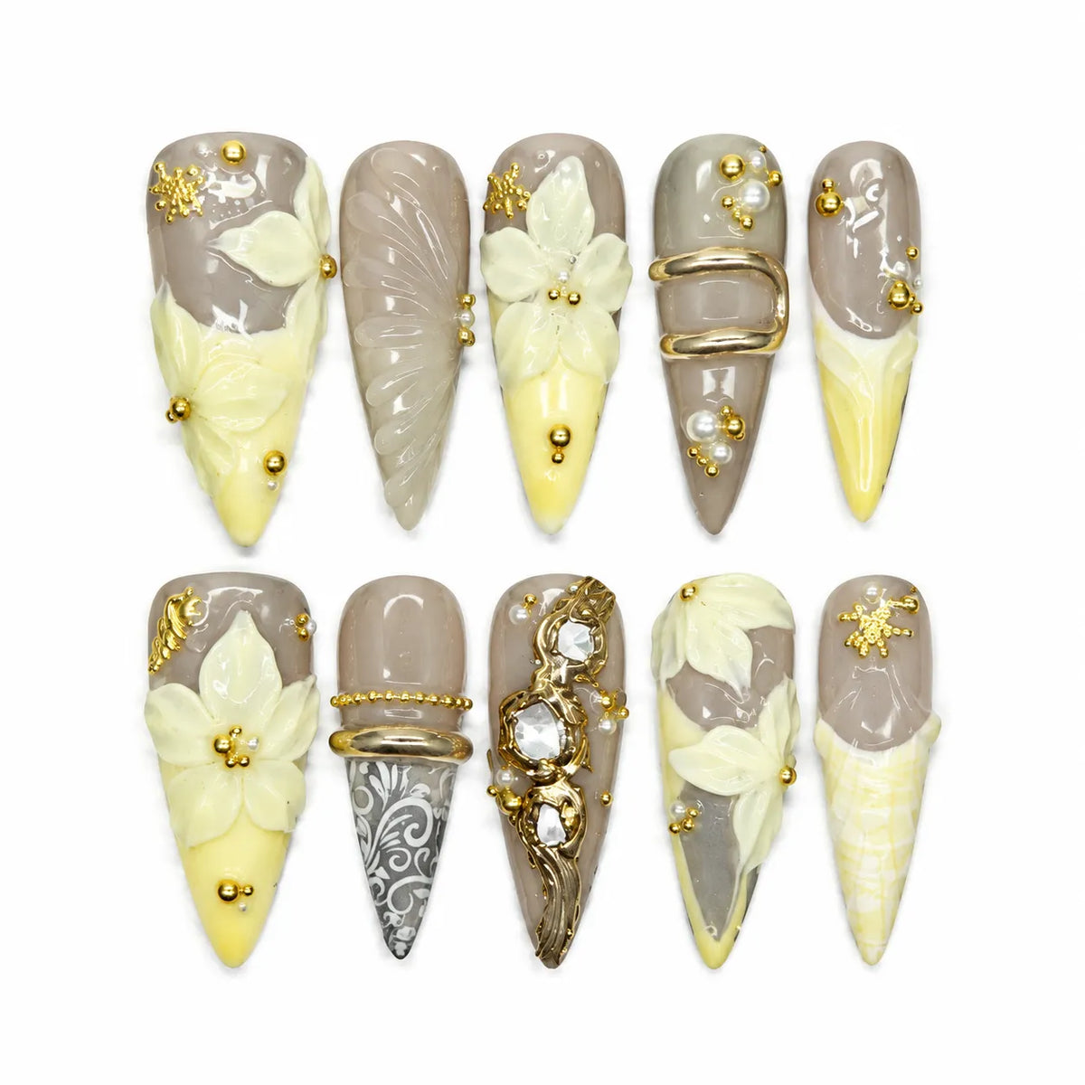 Buttercream Fleur NM-A040 Long Stiletto nail set with ivory flowers gold accents and yellow ombre
