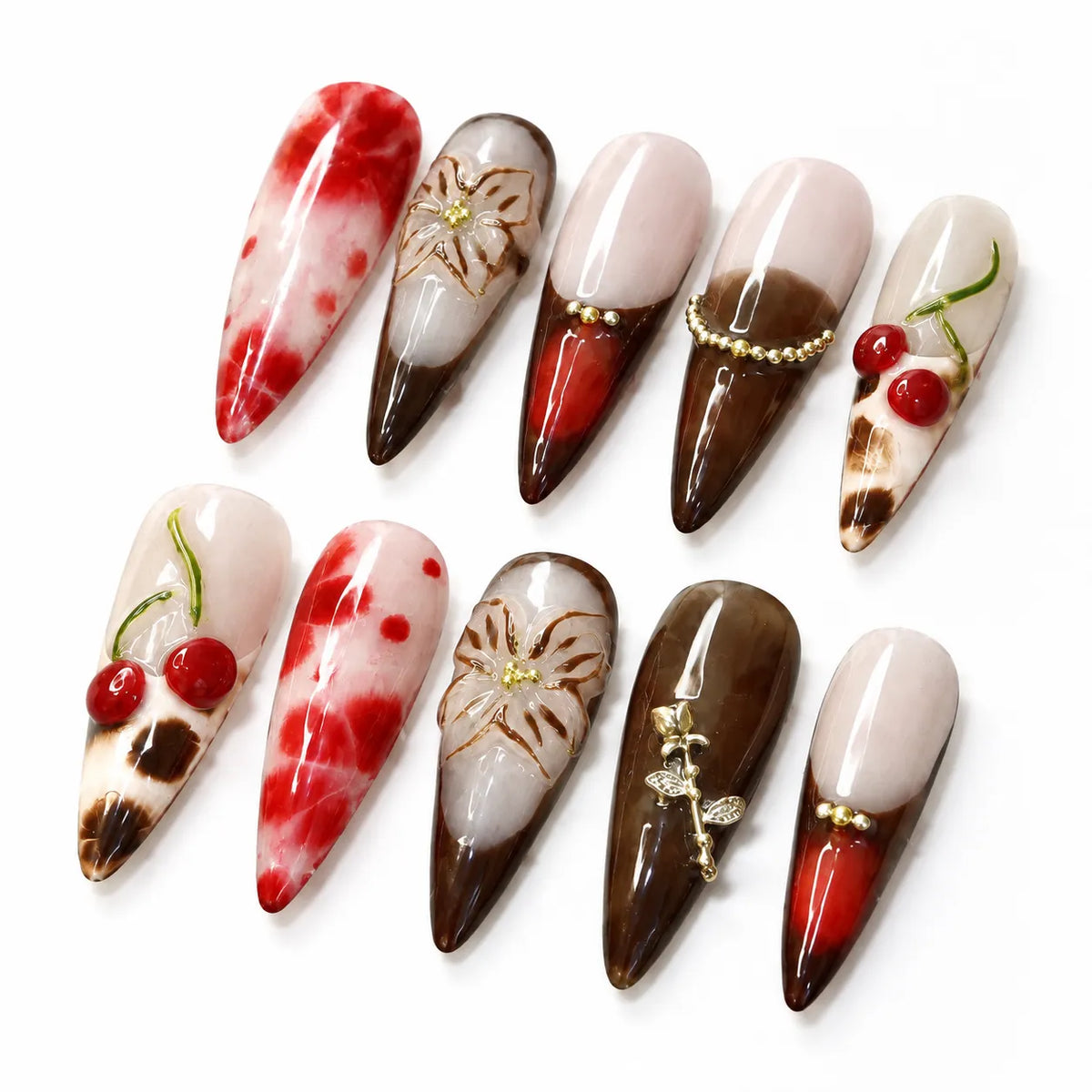 Angled view of Cherry Mocha Bloom Long Stiletto nails with red watercolor art, sculpted flowers, and mocha tips