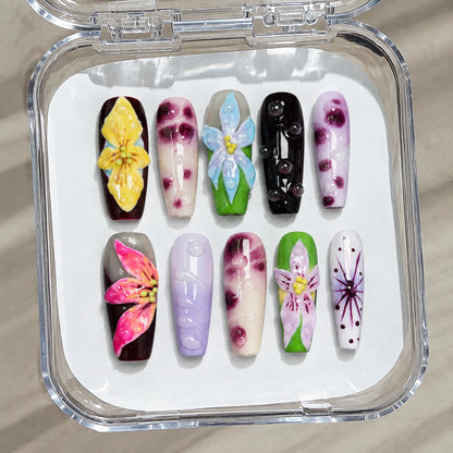 Chromatic Orchid Dew handmade Medium Coffin nail set arranged in a clear presentation case