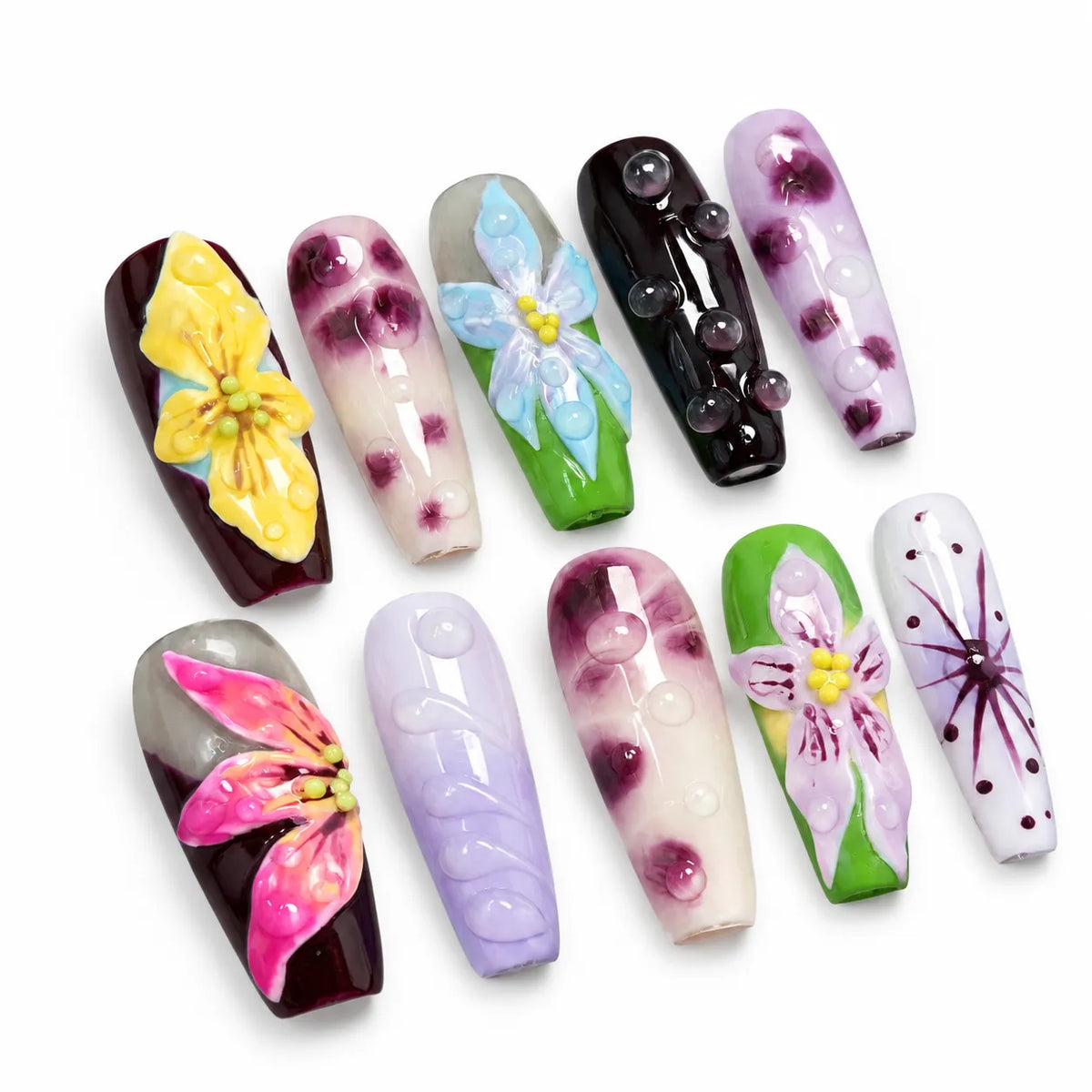 Detailed view of NM-A002 Medium Coffin nails with pink yellow blue and lavender floral art