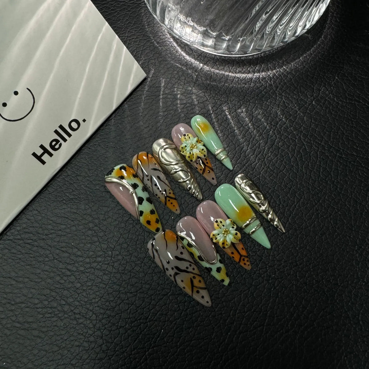 Additional lifestyle view of Chrome Wildflower Fusion floral animal print Long Stiletto nails