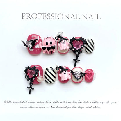 Devil Heart short oval press-on nails with cute gothic heart design on hand - lifestyle shot 💗😈