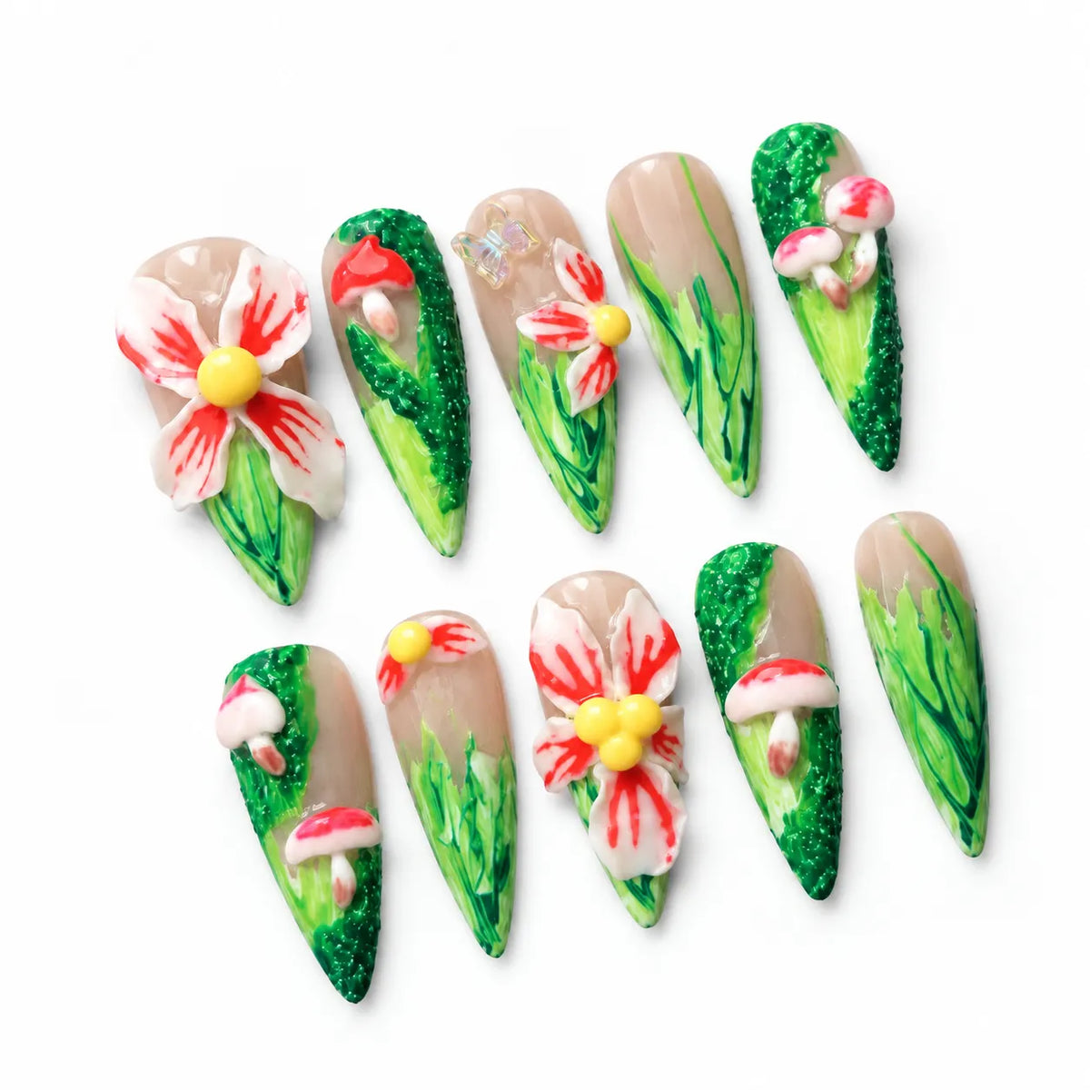 Angled view of nude and green Long Stiletto nails with sculpted flowers mushrooms and butterfly accent