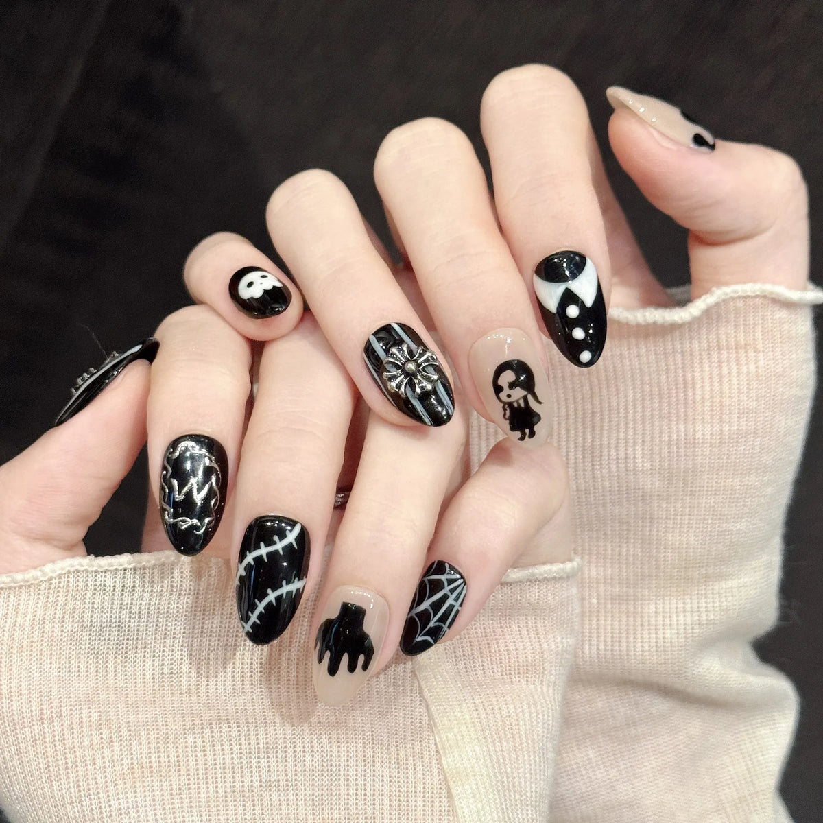 Gothic Shadow stiletto nails angled view showing black base, silver metallic accents, and 3D gothic art ⛓️