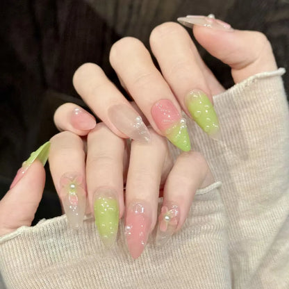 Green Grape almond nails angled view showing sweet ombre and romantic floral design 💚