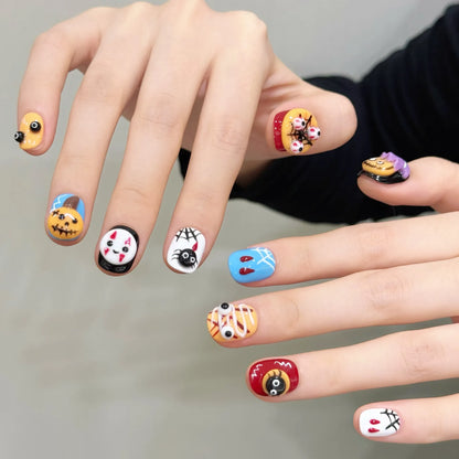 Halloween party monster short oval press-on nails 3032 shown in a lifestyle hand view