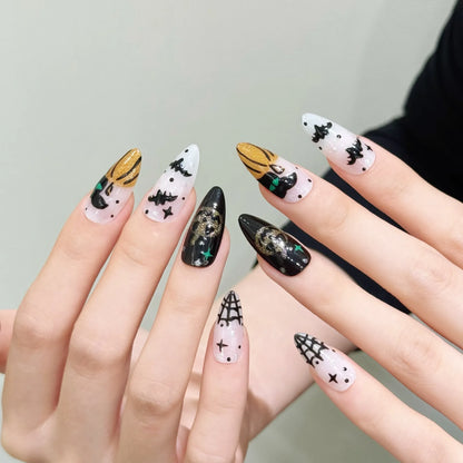 Halloween pumpkin devil medium almond press-on nails 3029 shown in a lifestyle hand view