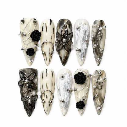 Inkthorn Noir NM-C171 Long Stiletto press-on nail set with black roses, silver rings, beads, and studs