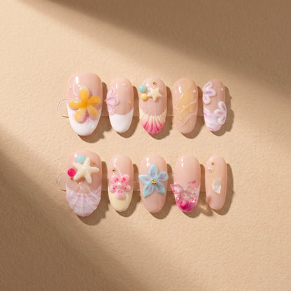 Ocean Shell 10-piece handmade press-on nail set with 3D seashell and starfish designs - product flat lay 🐚