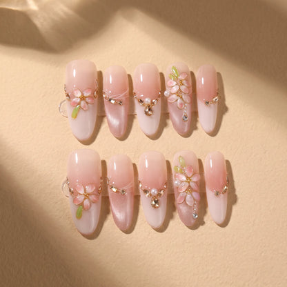Peach Gold 10-piece handmade press-on nail set with gold branch and rhinestone designs - product flat lay ✨
