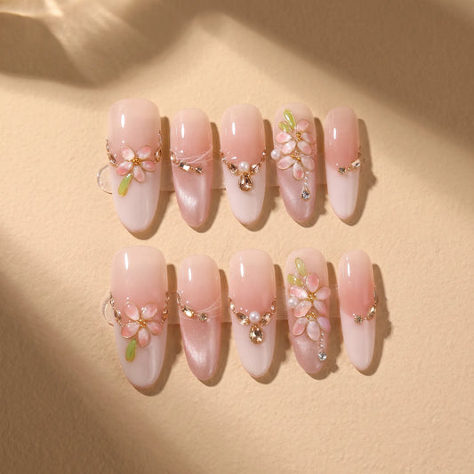 Peach Gold 10-piece handmade press-on nail set with gold branch and rhinestone designs - product flat lay ✨
