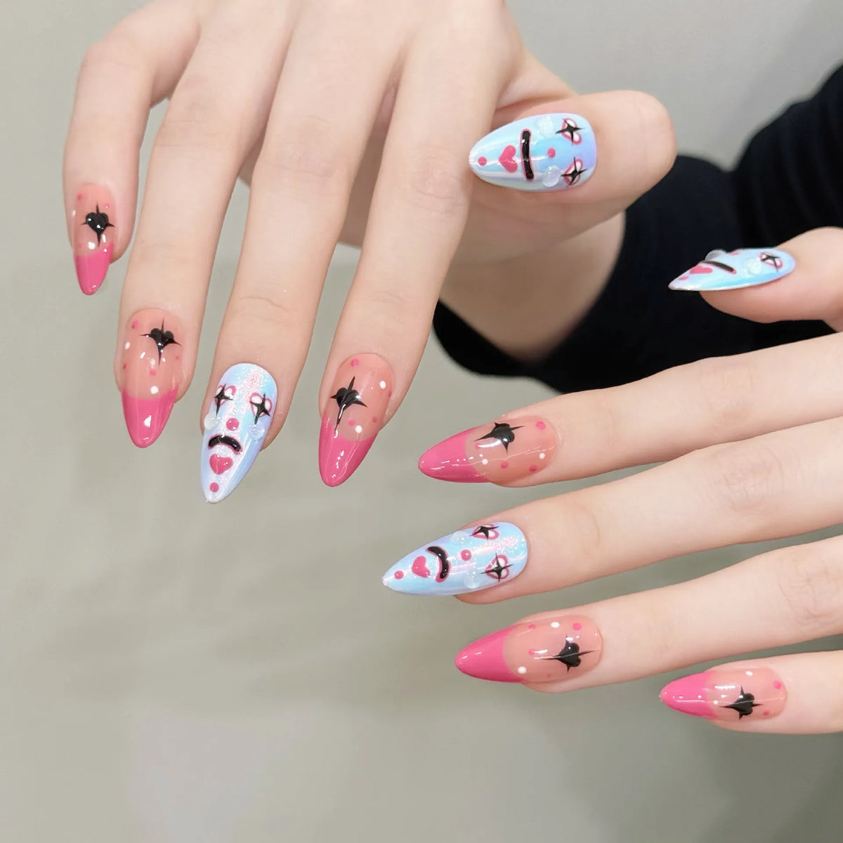 Playful clown medium almond press-on nails 3034 worn on hands