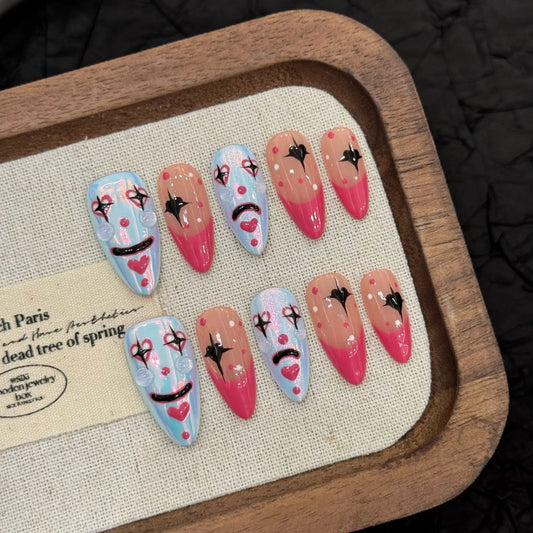 Playful clown medium almond press-on nails 3034 arranged as a hand-painted set