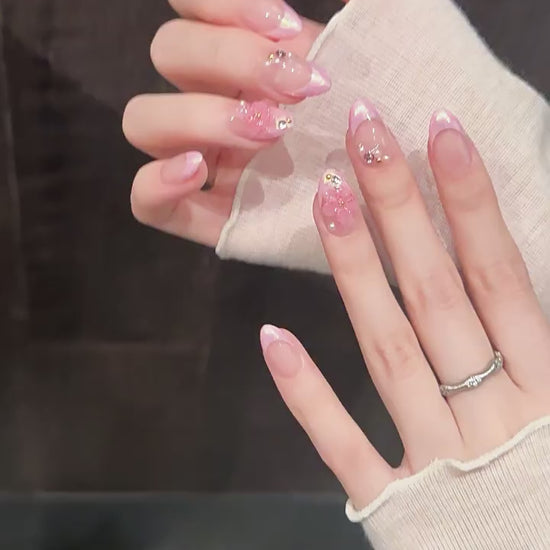 Rose Quartz Glow press-on nails with chrome aurora and French tip designs - 360 degree product video showcase