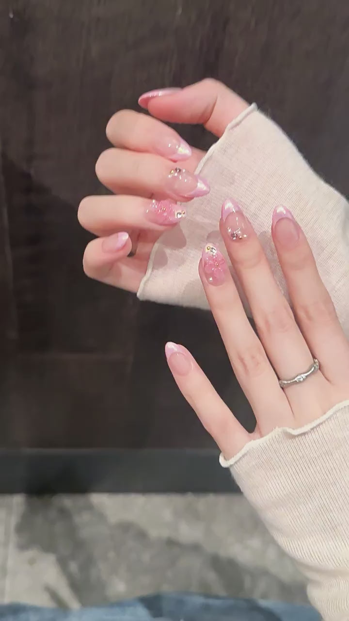 Rose Quartz Glow press-on nails with chrome aurora and French tip designs - 360 degree product video showcase