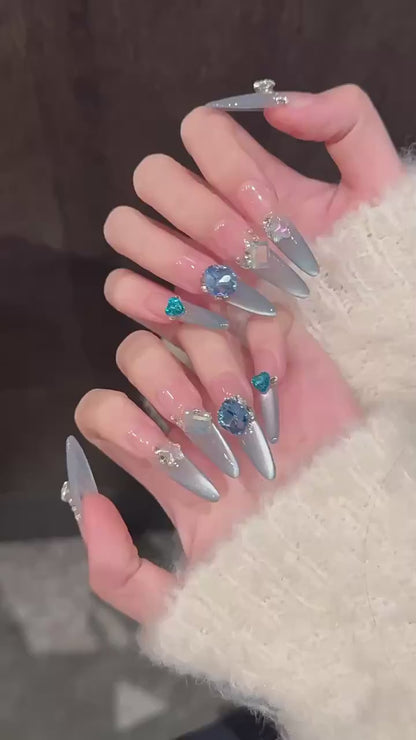 Blue Danube ice blue cat-eye press-on nails with sapphire crystals - 360 degree product video showcase