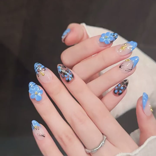 Leopard Lagoon press-on nails with blue floral and leopard print designs - 360 degree product video showcase