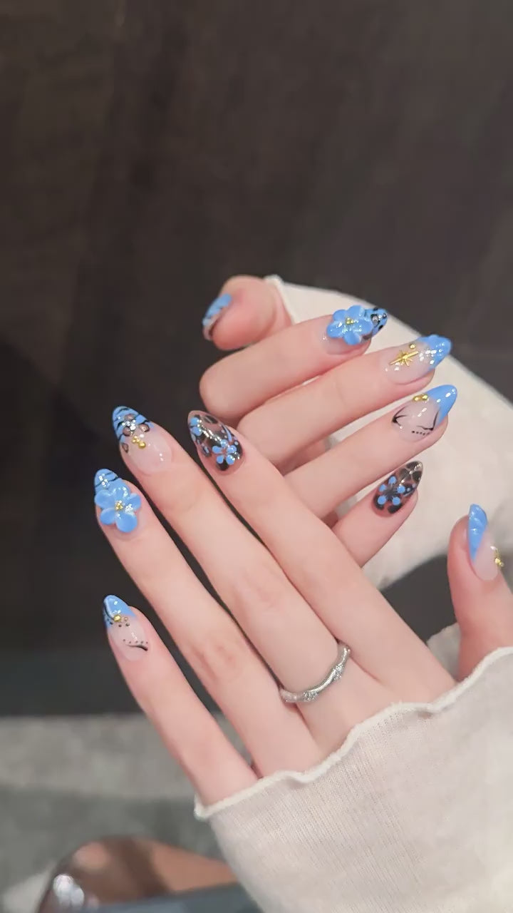 Leopard Lagoon press-on nails with blue floral and leopard print designs - 360 degree product video showcase