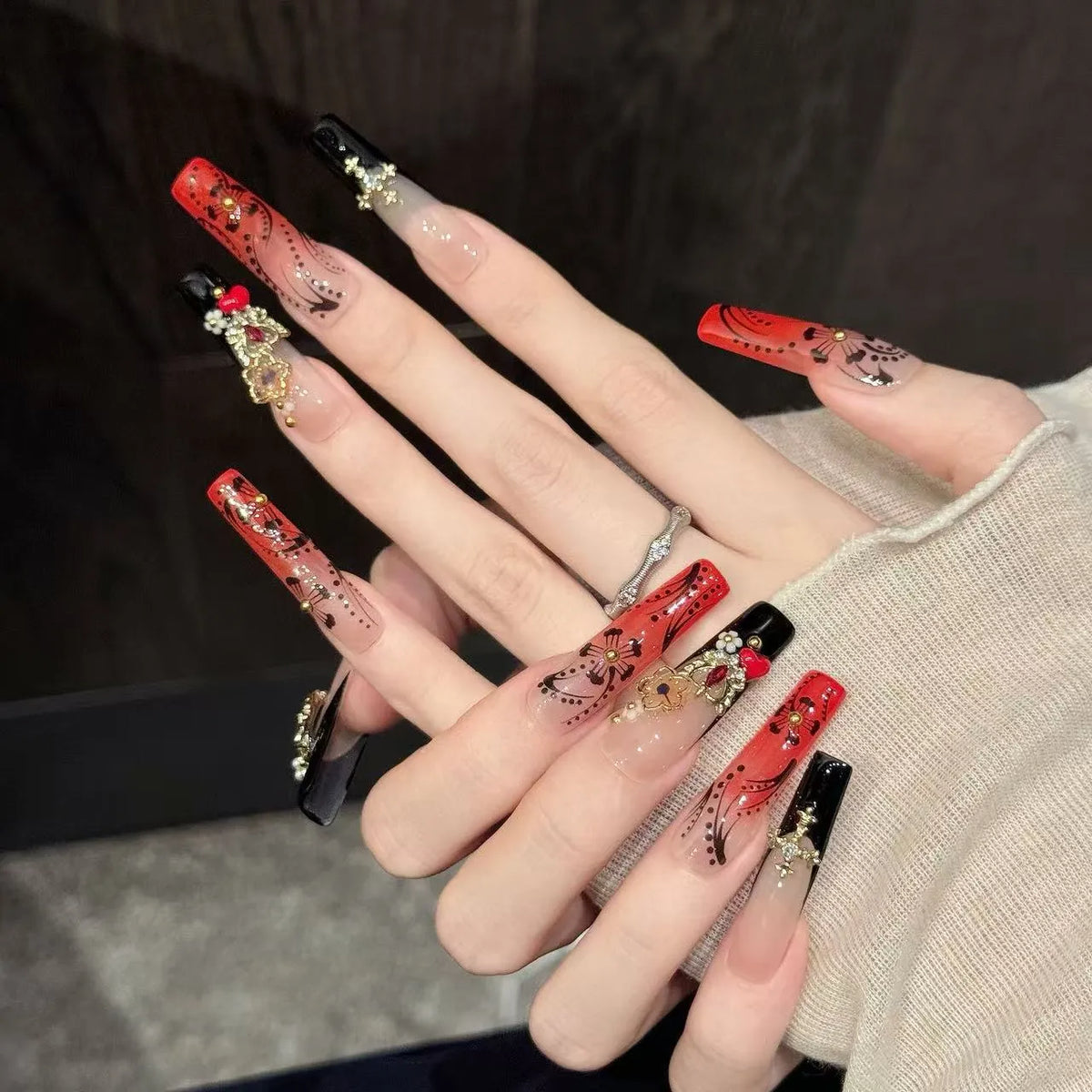 Close-up detail of Red Ink Floral hand-painted florals, red to black ombre gradient, and glossy finish 🎨✨