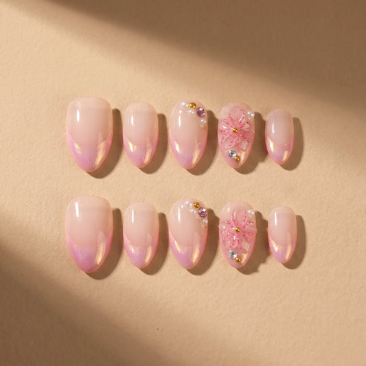 Rose Quartz Glow 10-piece handmade press-on nail set with chrome aurora and French tip designs - product flat lay