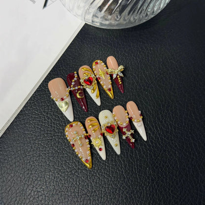 Additional lifestyle view of Sacred Garnet Heart cross and pearl Long Stiletto nails