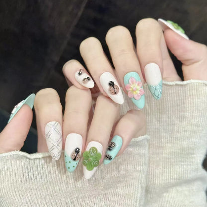 Summer Flower almond nails angled view showing fresh nature-inspired floral design 🌸