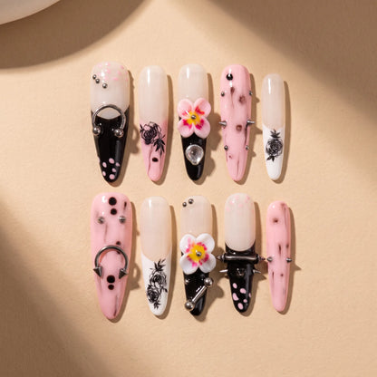 Thorn Mystery 10-piece handmade press-on nail set with gothic rose and metal designs - product flat lay 🥀