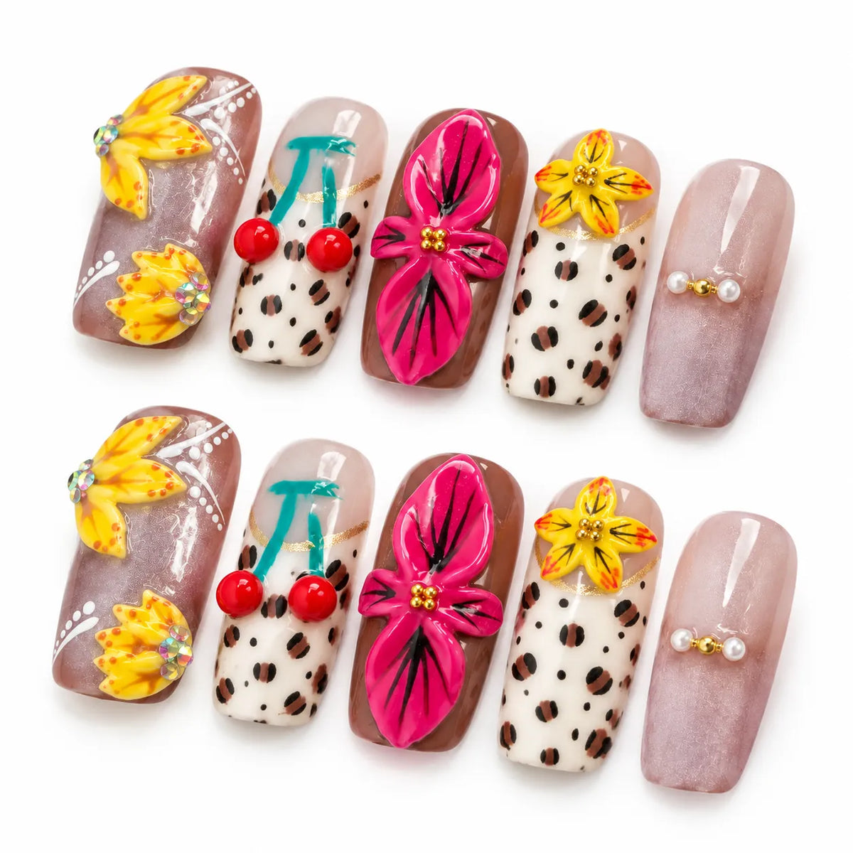 Detail view of Tropic Feline Bloom nails showing hand-painted leopard print bright florals and gold accents