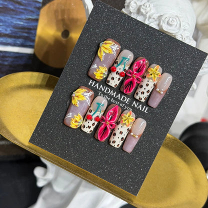Additional lifestyle view of Tropic Feline Bloom bright animal-print Long Coffin nails