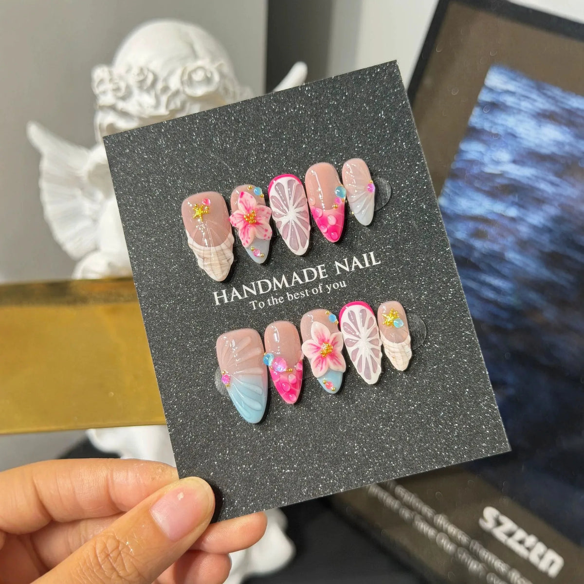 Additional lifestyle view of Tropical Shell Blossom fruit party Medium Almond nails